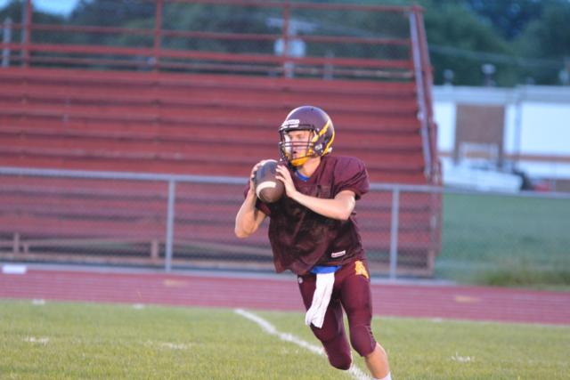 East Alton-Wood River's Justin Angler drops for a pass on Friday night against Bunker Hill. (Photo by 