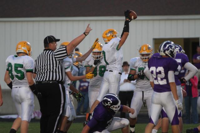 Southwestern High School #7 Senior Jesse Arnold recovering a fumble at Litchfield. (Photo courtesy of Leslie Manula Photography)