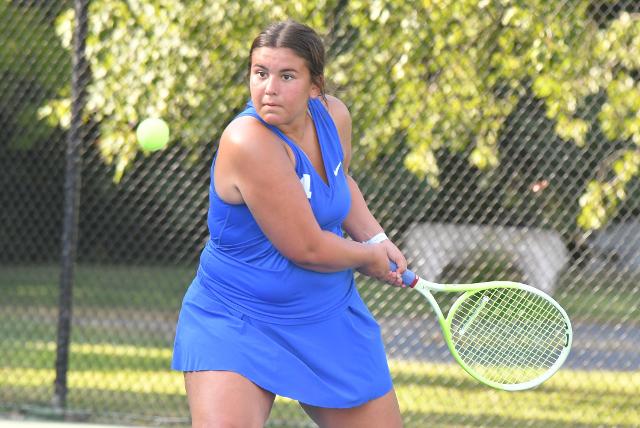 Mia Lopez of Marquette handles a serve.