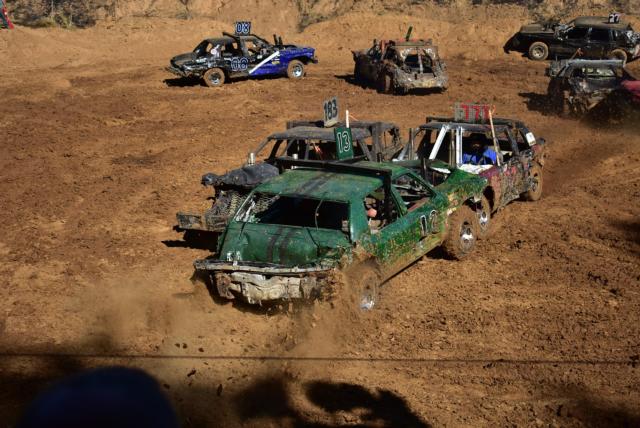 First place Scott McAdams (#183), Third place Rodney Gress (#13) and #777 hit in the Stock Class during the derby on Sunday