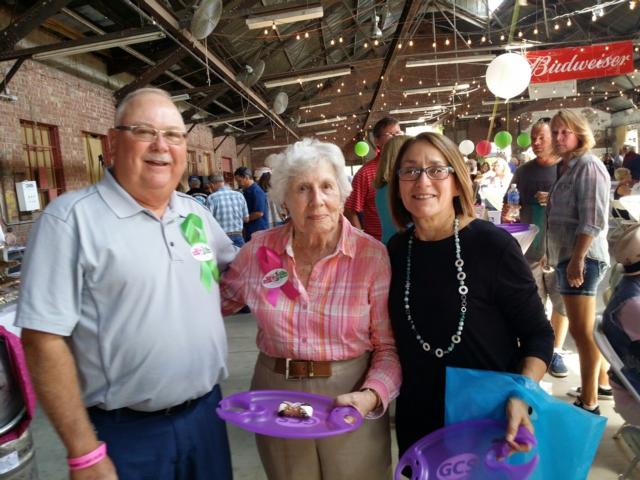 Pat McLaughlin, Mary Woodcock and Mimi Almonroeder enjoy some delicious food during the Alton Memorial Hospital White Cross Auxiliary's