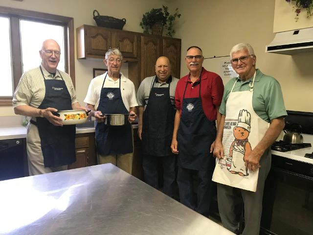 Resurrection Lutheran Men’s Club members cooking chili for the Chili Drive Thru