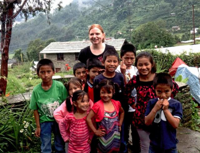 Amy with some of the children from the children’s home in Nepal. Most of the village where these children live was destroyed by the earthquake this spring but all of the children are fine.