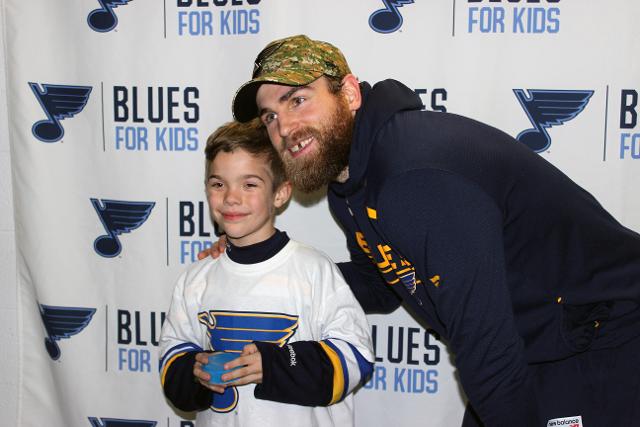 Members of the Blues organization, including captain Ryan O'Reilly