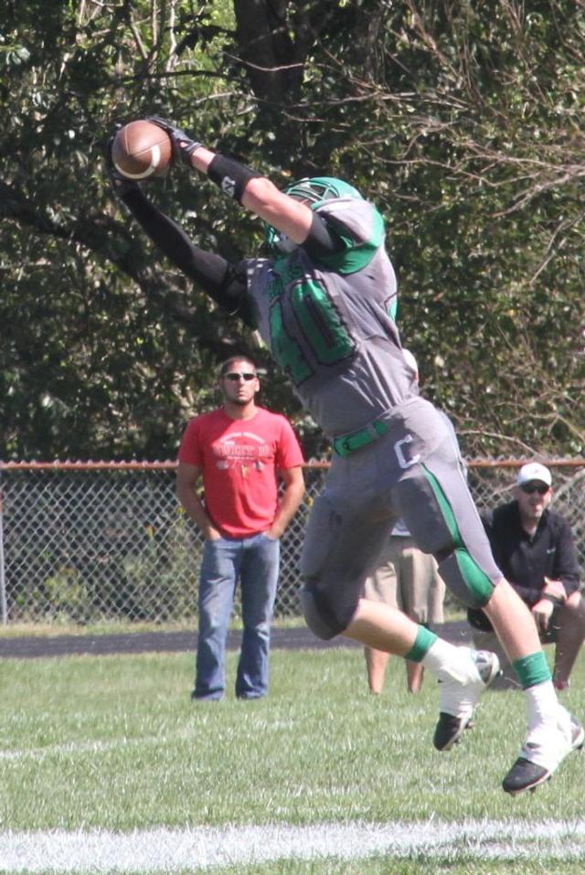 Alex Bowker snares a catch against West Central. (Photo courtesy of Sherry Fraley Photography)