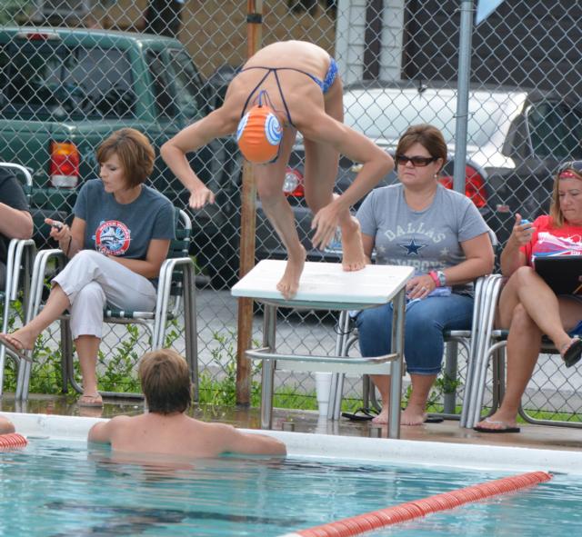 Bailey Grinter dives in for a 50 spring earlier in the year. Grinter has started the fall high school season right where she left off in the summer with some top times and places in opening meets.