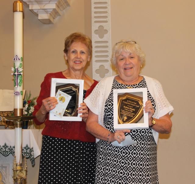 Liz Cordes (left) with Friend of Ss. Peter and Paul Meritorious Service Award; Barb Hinson (Class of 1956) with Distinguished Alumni Award