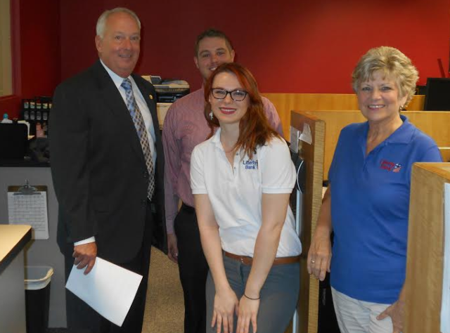 Rep. Dan Beiser is pictured with Liberty Bank Tellers Amy Orban, Tyler Shewmake and Pat Kimbro.