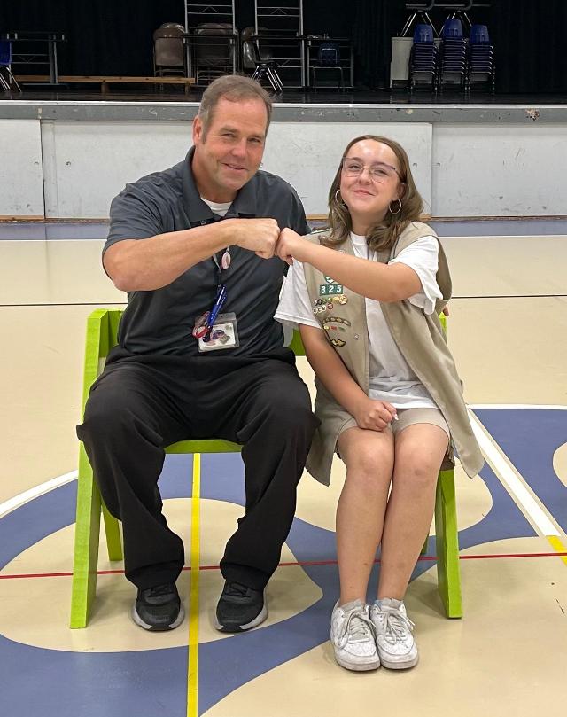 Principal John Ducey and Kennedy Ridgley.