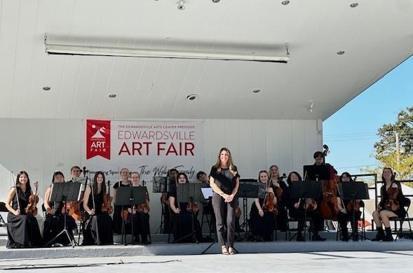 EHS orchestra director Victoria Voumard with her group at the Edwardsville Arts Fair.