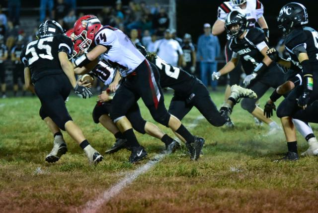 #64, Trenton Buchanan, protects #40, Scout White, during Friday night's game at West Central.