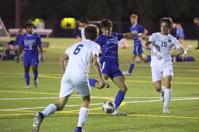 Myles Paniagua shoots and scores his second goal of the game Thursday night at Gordon Moore Park. 